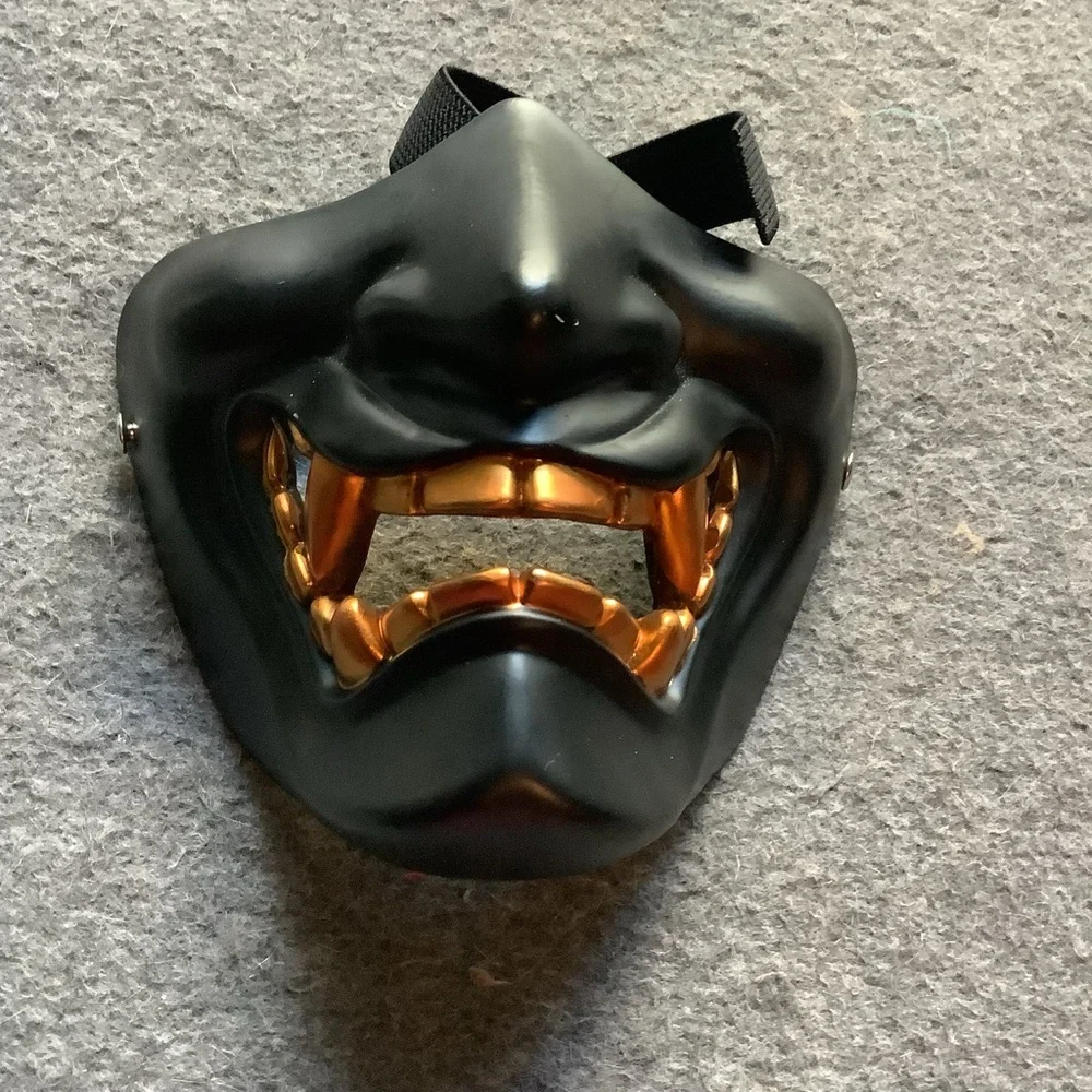 Black and Gold Mask with adjustable strap